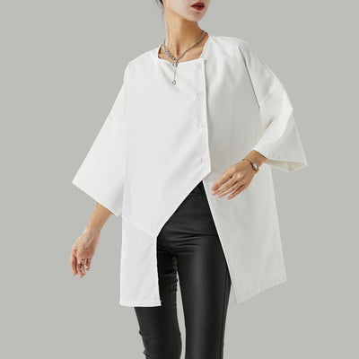 Annika - Stilfuld bluse med asymmetrisk halsudskæring