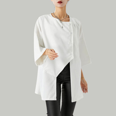 Annika - Stilfuld bluse med asymmetrisk halsudskæring