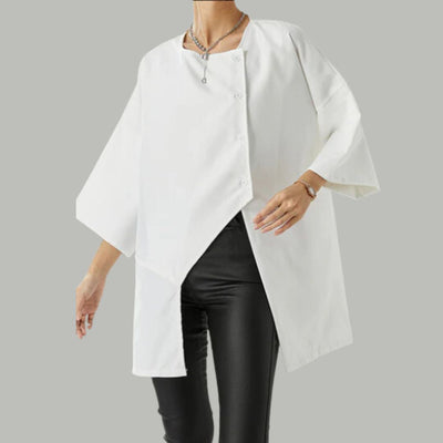 Annika - Stilfuld bluse med asymmetrisk halsudskæring